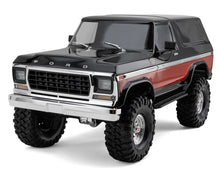 Load image into Gallery viewer, Traxxas TRX-4® 1/10 Trail Crawler Truck w/1979 Bronco Clipless Body w/TQi™ 2.4GHz Radio