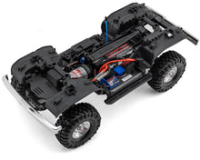 Load image into Gallery viewer, Traxxas TRX-4® 1/10 Trail Crawler Truck w/1979 Bronco Clipless Body w/TQi™ 2.4GHz Radio